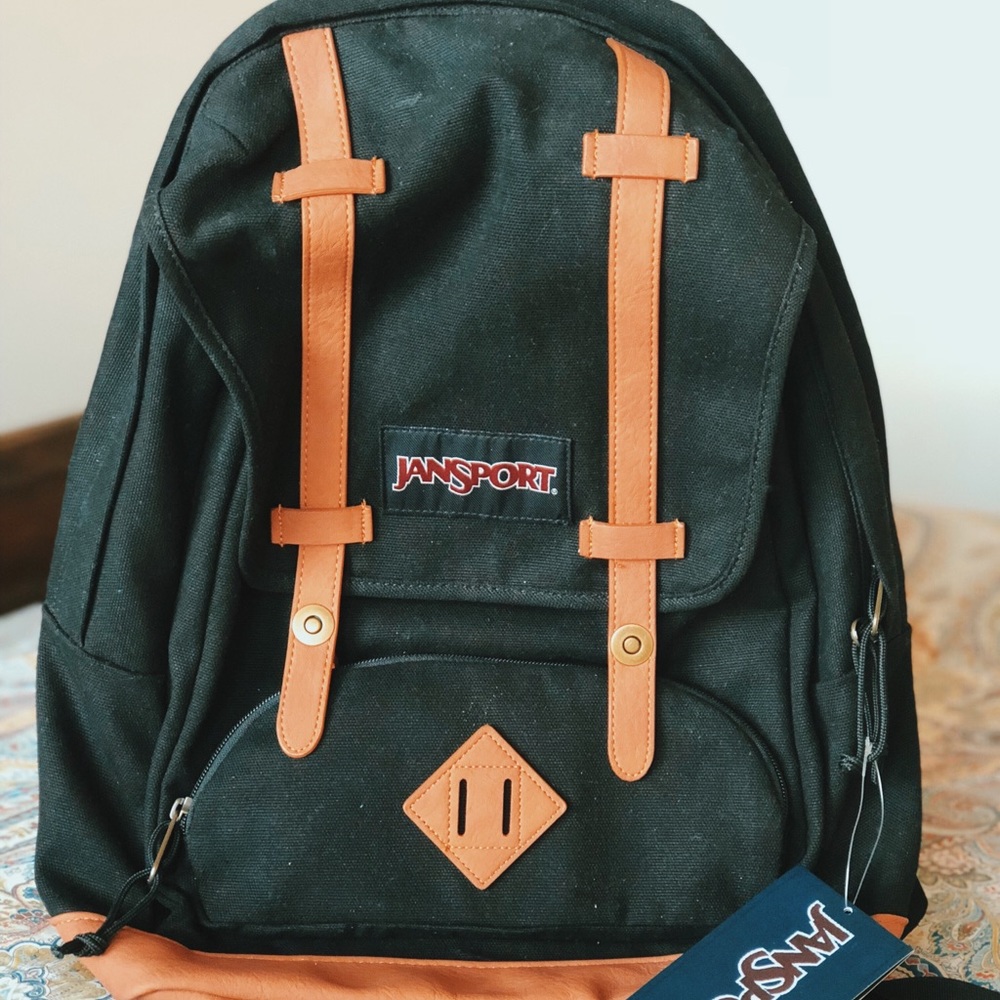NEW JANSPORT BLACK BACKPACK | leather bottom